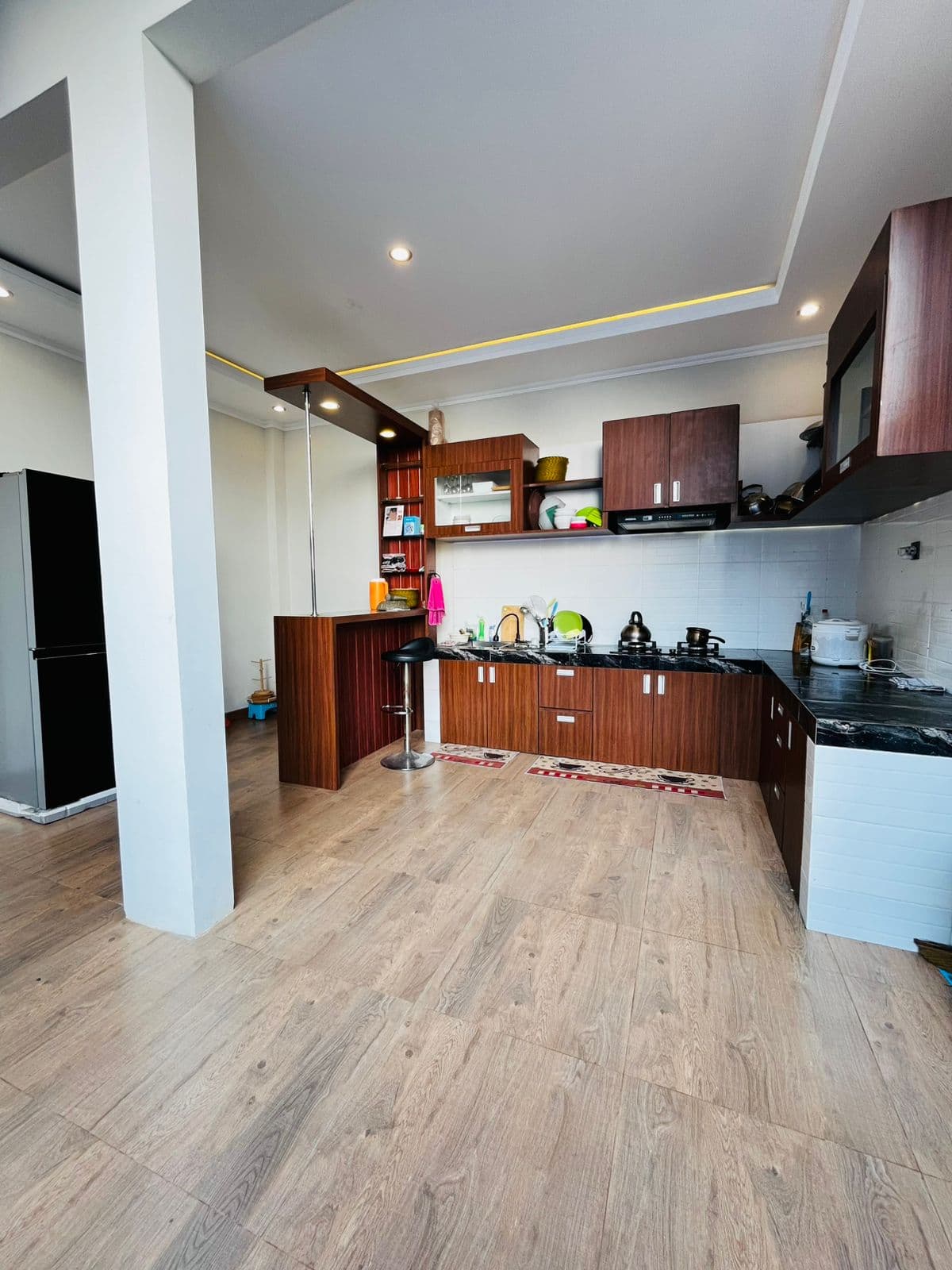 Kitchen with timber cabinetry and a breakfast counter